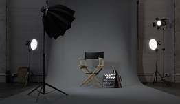 Spotlight shining on a chair in a studio